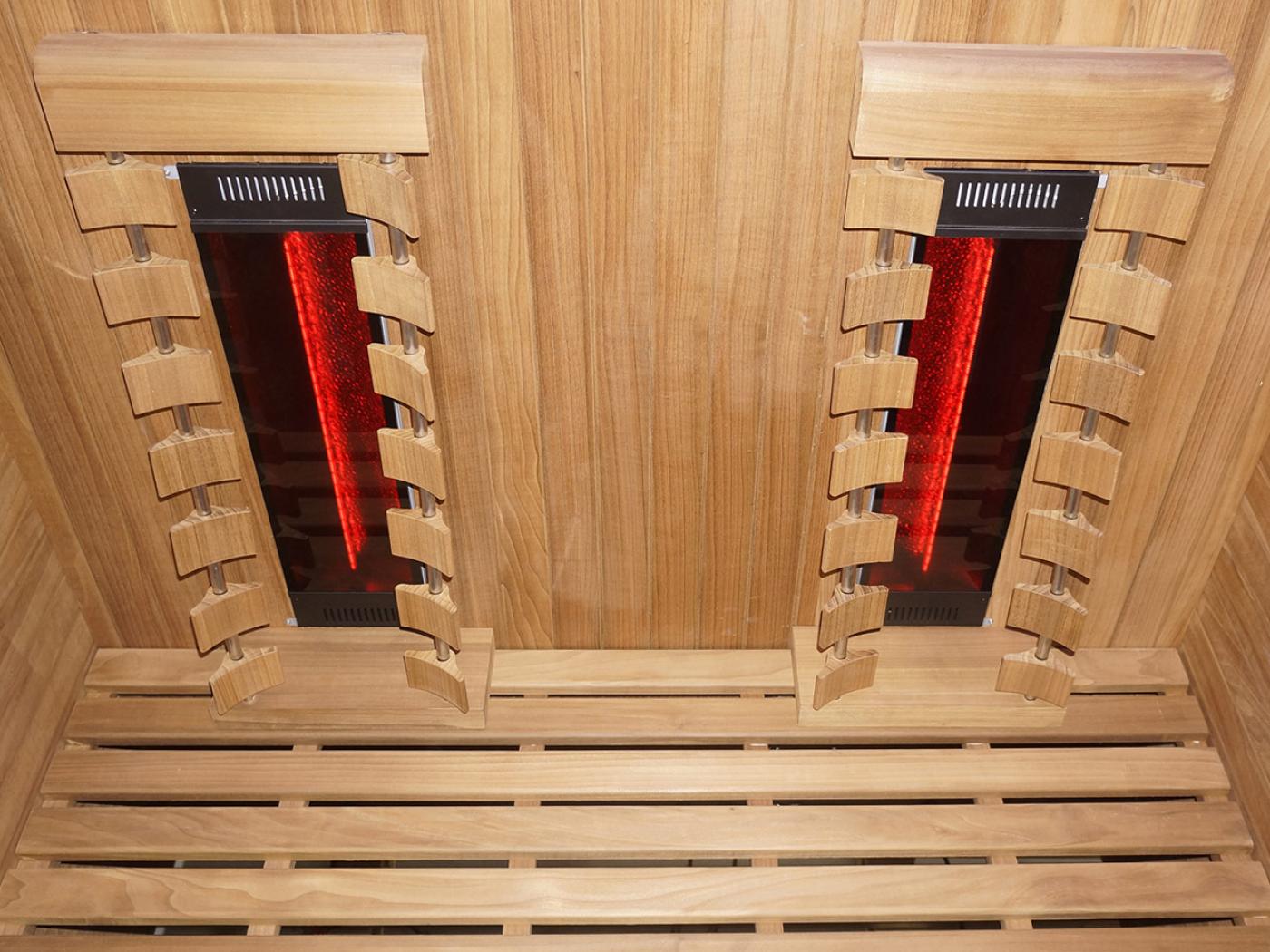 Interior of Hekla infrared sauna with dual infrared heaters and wooden bench seating
